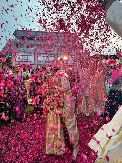 Nandana and Sean showered by rose petals